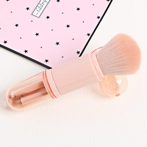 A Small Makeup Brush Set next to a pink box.