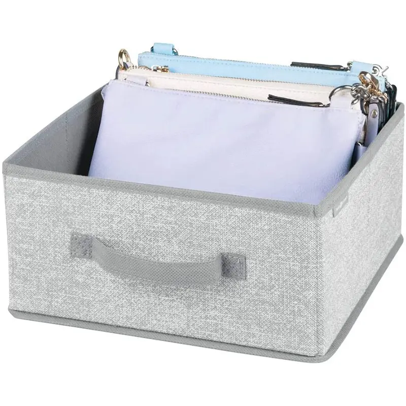 A gray Storage Bin for Shelves with a purse in it.