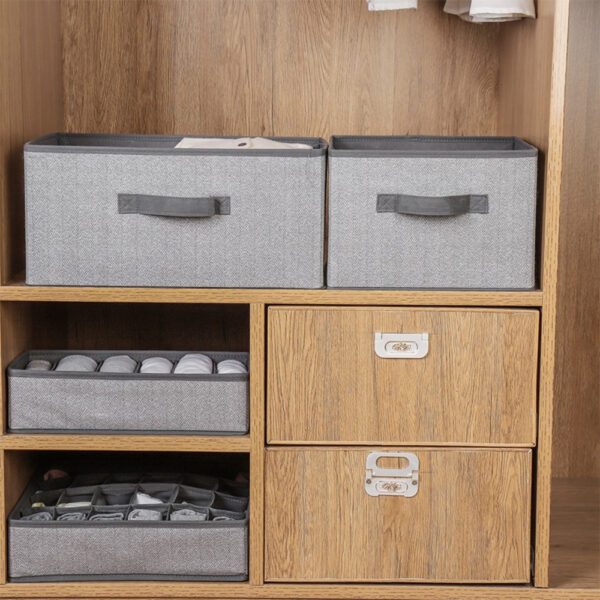 A closet with several Storage Bins for Shelves.