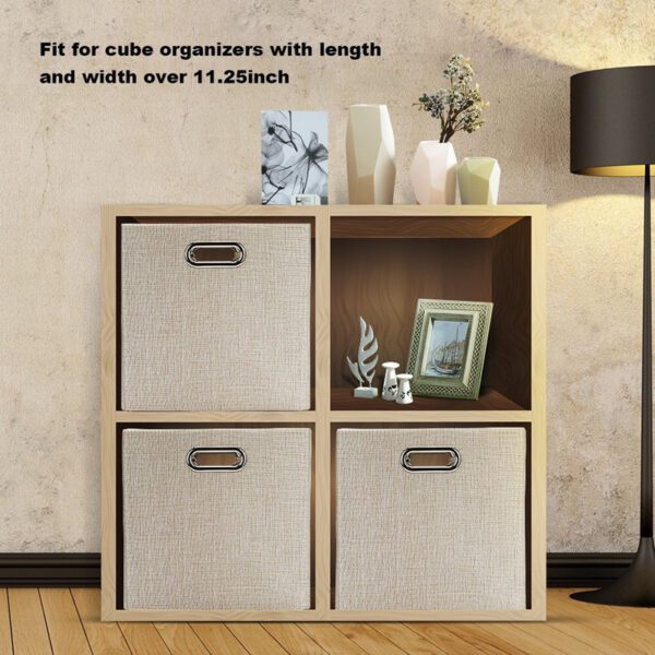 Four cube organizers with Foldable Storage Bins with Dual Metallic Handles, a lamp, and a vase in a room.