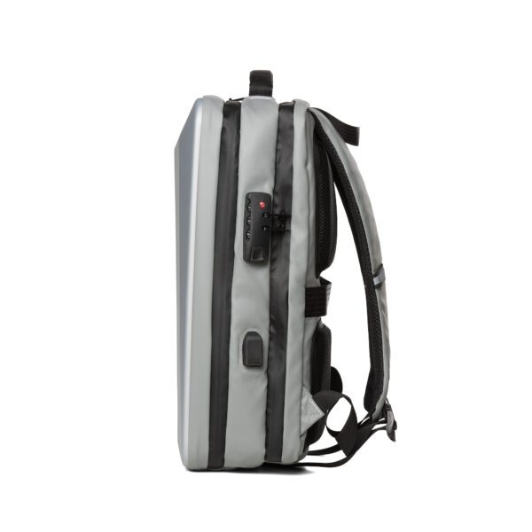 The back of a silver hard case backpack with unique edge design - 16.53" x 11.81" x 5.51" with black straps.