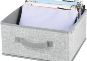 A gray Storage Bin for Shelves with a purse in it.